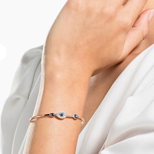 NWT. Swarovski Symbolic bangle
Evil eye, Blue, Mixed metal finish